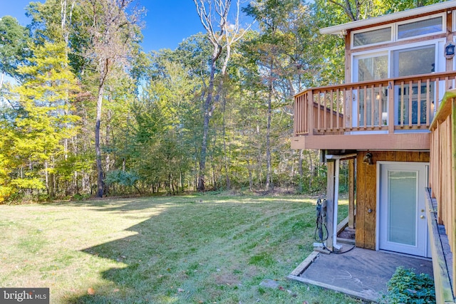 view of yard featuring a deck