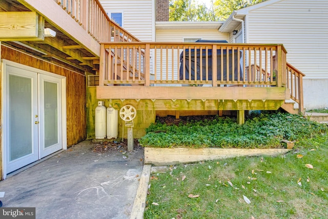 wooden deck featuring french doors