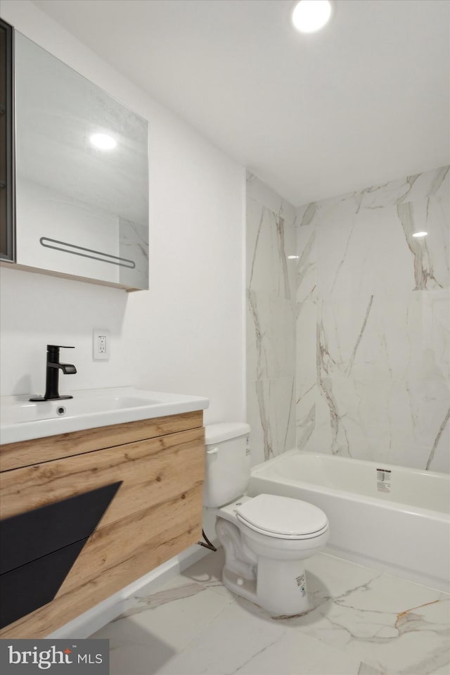 full bathroom featuring tile flooring, vanity, tiled shower / bath combo, and toilet