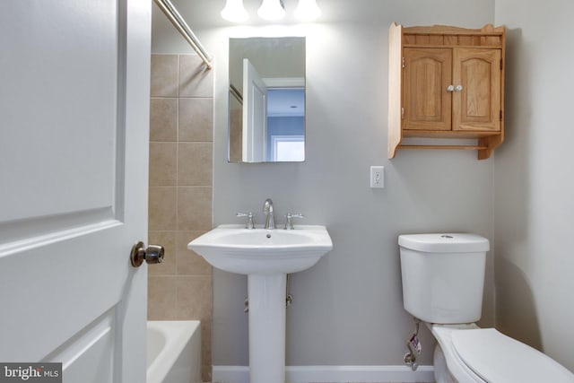 full bathroom with toilet, shower with separate bathtub, and sink