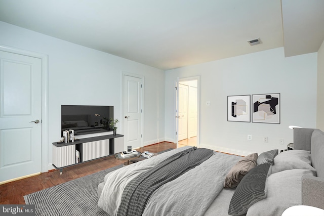 bedroom featuring hardwood / wood-style flooring