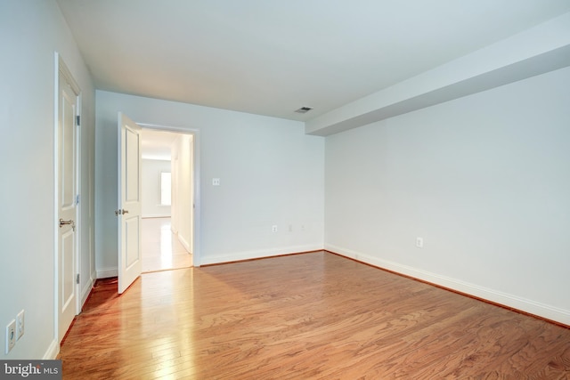 empty room with light wood-type flooring