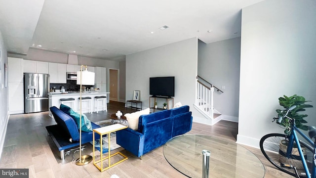 living room featuring light wood-type flooring