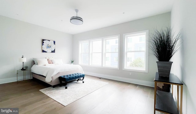 bedroom featuring wood-type flooring