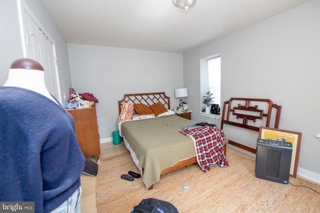 bedroom with wood-type flooring