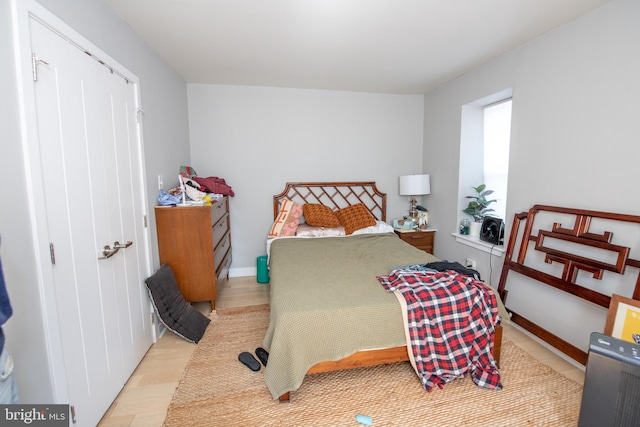 bedroom with light hardwood / wood-style floors