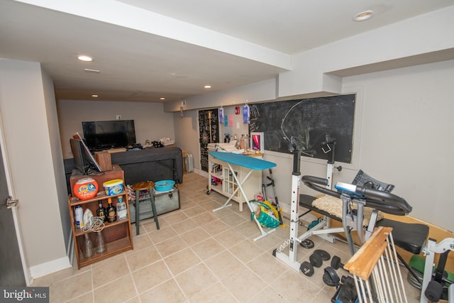 playroom featuring light tile floors