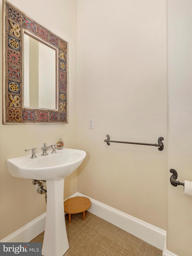 bathroom featuring tile flooring