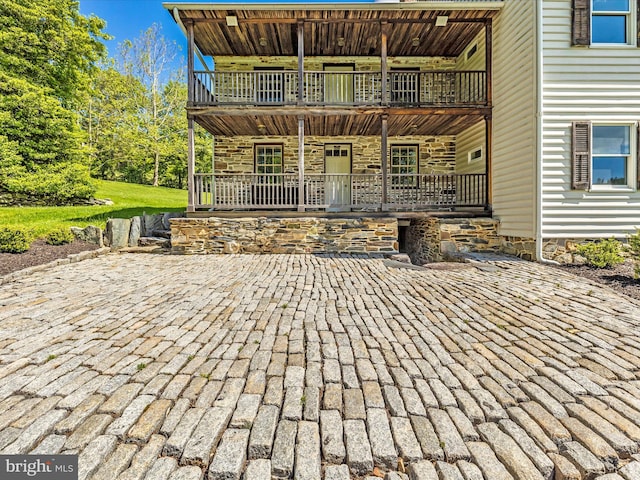 view of patio / terrace featuring a balcony