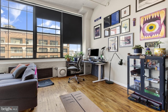 home office with light wood-type flooring