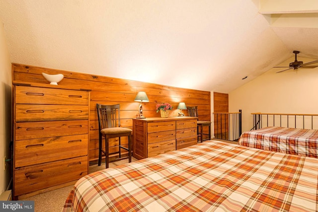 carpeted bedroom featuring vaulted ceiling and ceiling fan