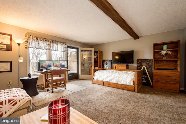 carpeted bedroom featuring beam ceiling and a textured ceiling