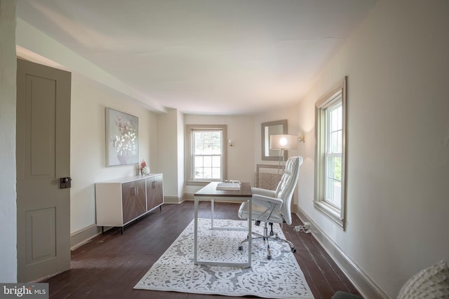 sitting room with dark hardwood / wood-style flooring