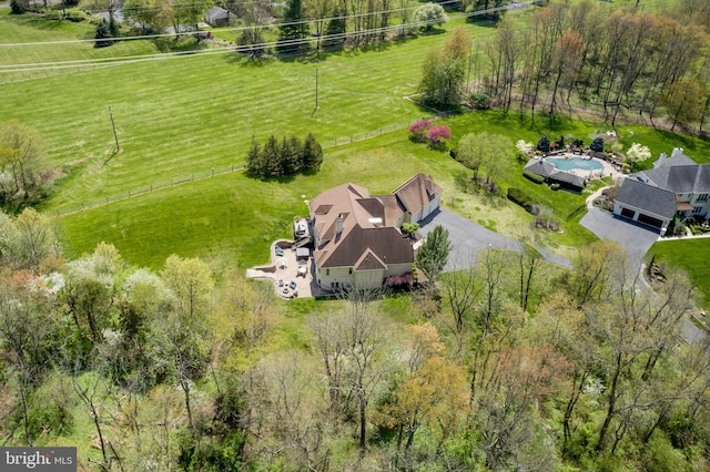 birds eye view of property featuring a rural view