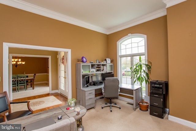 carpeted office space with an inviting chandelier and ornamental molding