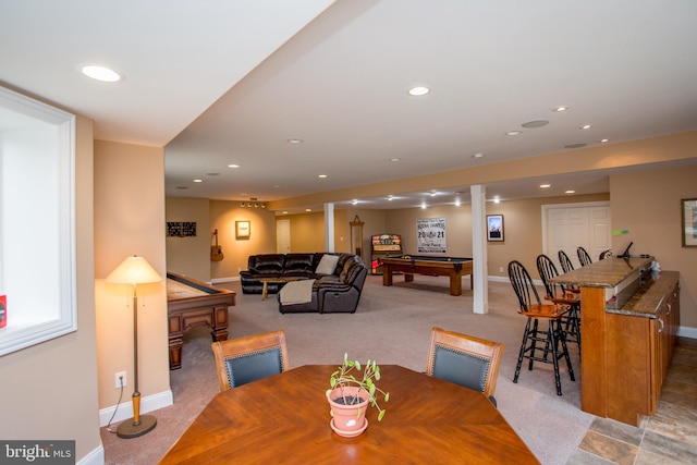 view of carpeted dining space