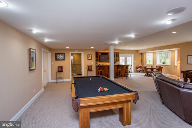 playroom featuring light colored carpet, indoor bar, and billiards