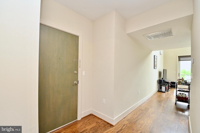 foyer featuring hardwood / wood-style floors