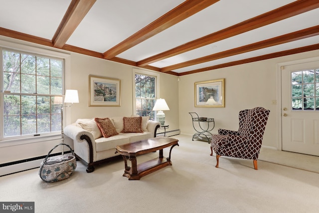 carpeted living room with beam ceiling, baseboard heating, and a wealth of natural light