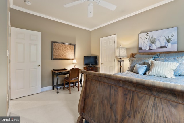 carpeted bedroom with ceiling fan and crown molding