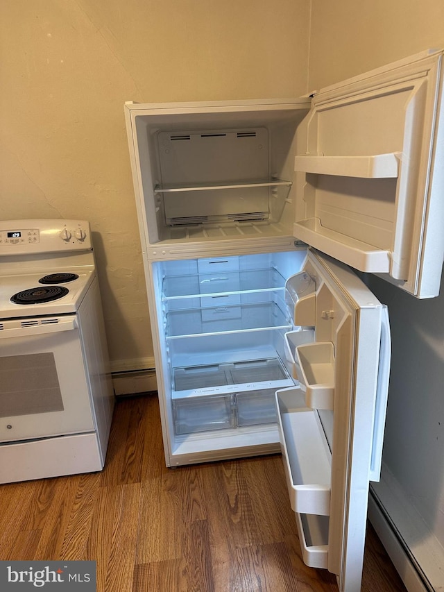 details with hardwood / wood-style flooring, white electric stove, and baseboard heating