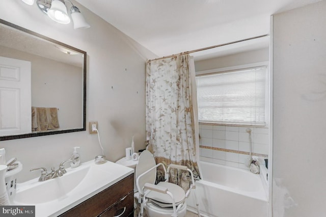 full bathroom with shower / bathtub combination with curtain, vanity, and toilet