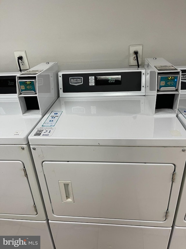 laundry room with separate washer and dryer