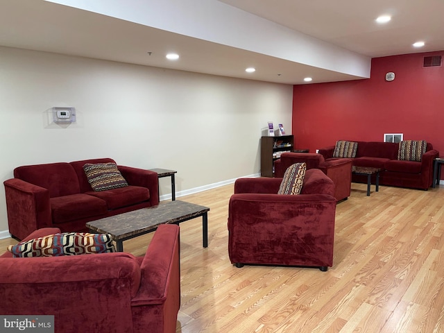 living room with light hardwood / wood-style flooring