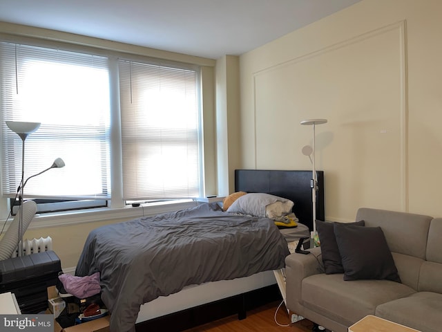 bedroom featuring wood-type flooring