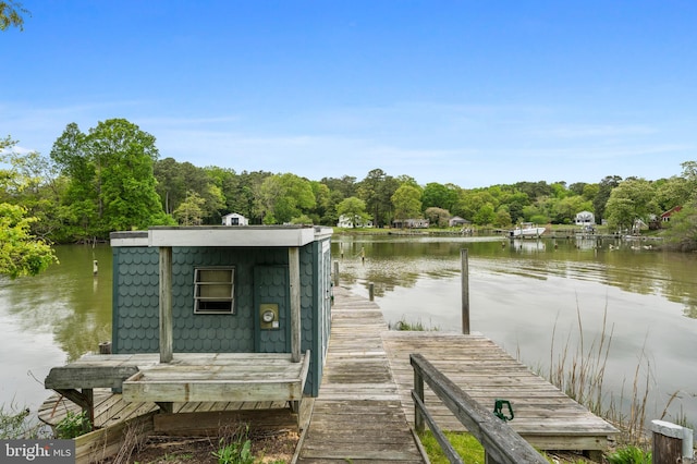 view of dock with a water view