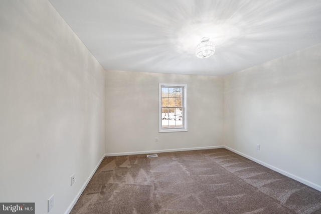 unfurnished room featuring carpet floors