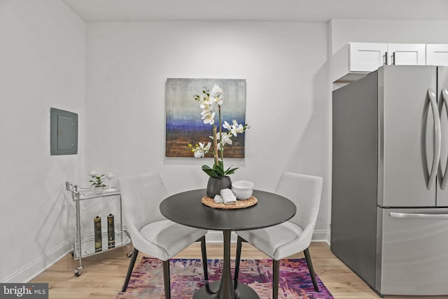 dining room with light hardwood / wood-style floors