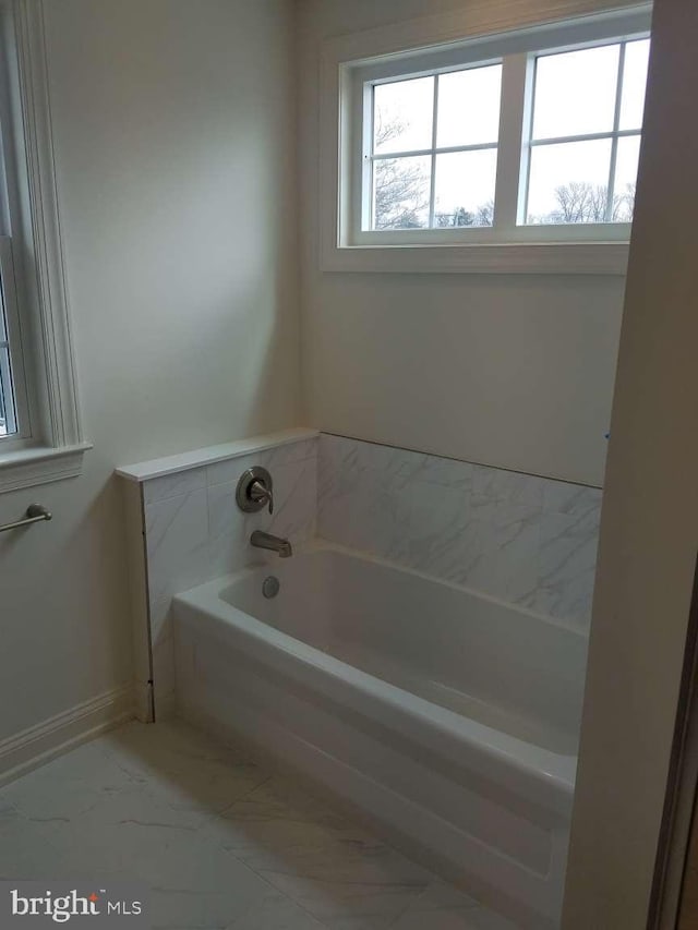 bathroom featuring a bathtub