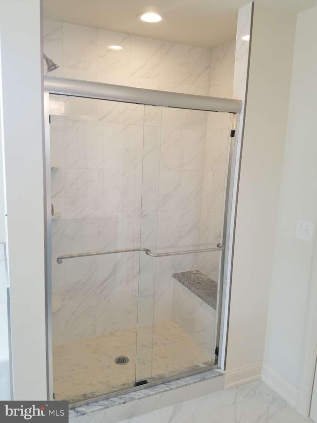 bathroom featuring walk in shower