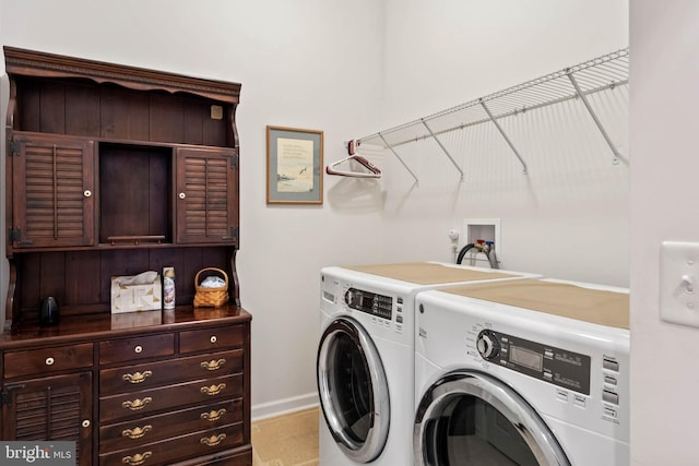 washroom with separate washer and dryer