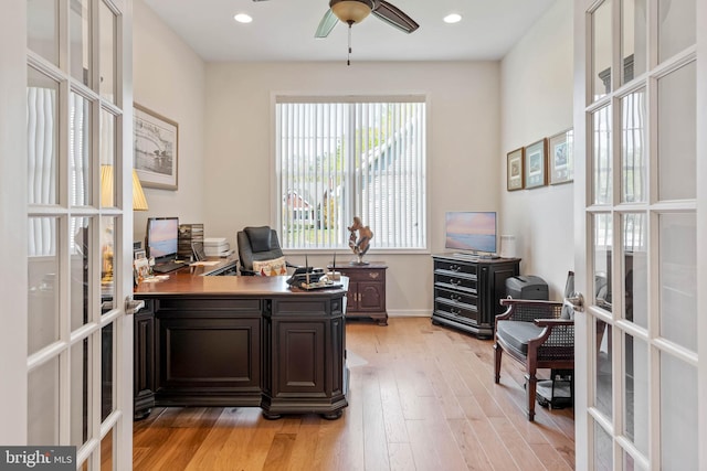 office with french doors, ceiling fan, and light hardwood / wood-style flooring