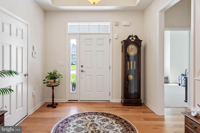 entryway with light hardwood / wood-style floors