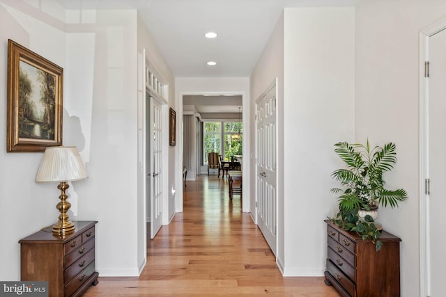 hallway featuring light wood-type flooring