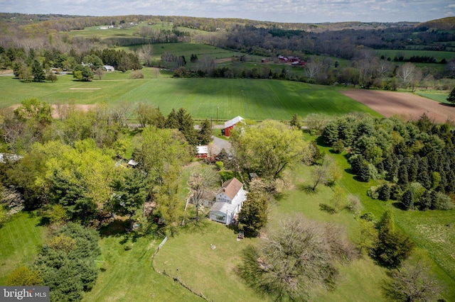 birds eye view of property with a rural view