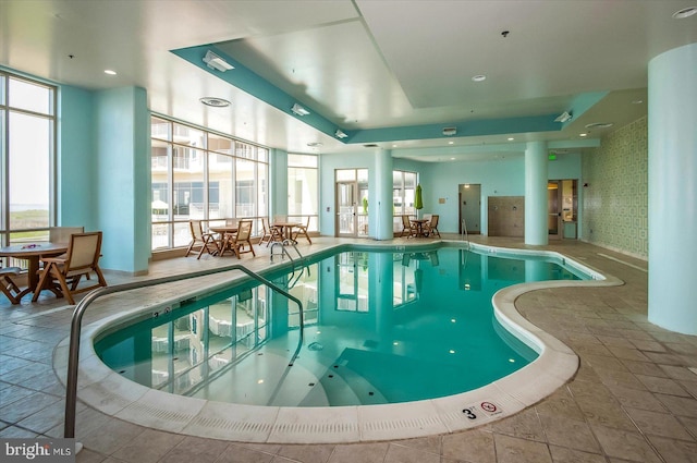 view of swimming pool featuring a jacuzzi