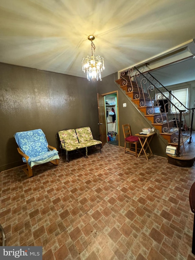 playroom with an inviting chandelier