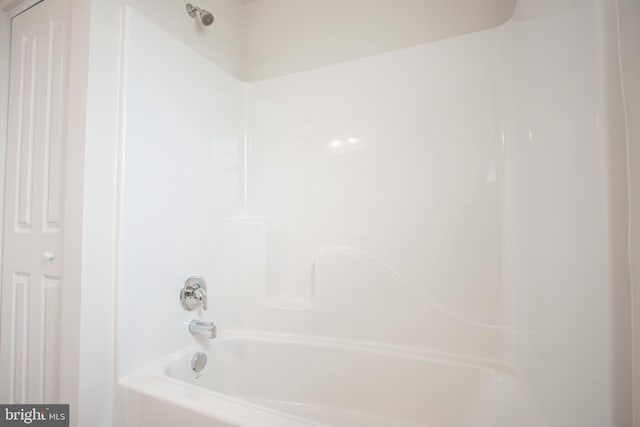 bathroom with shower / bathtub combination