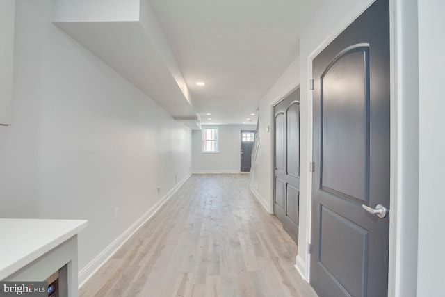 hallway featuring light hardwood / wood-style flooring