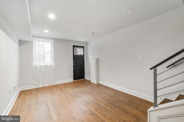 entrance foyer with hardwood / wood-style floors