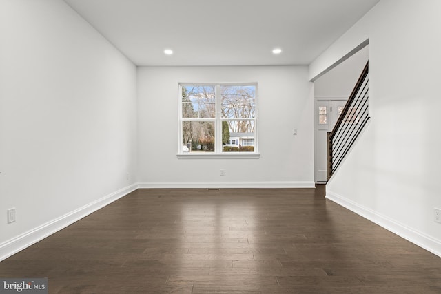 interior space with dark wood-type flooring