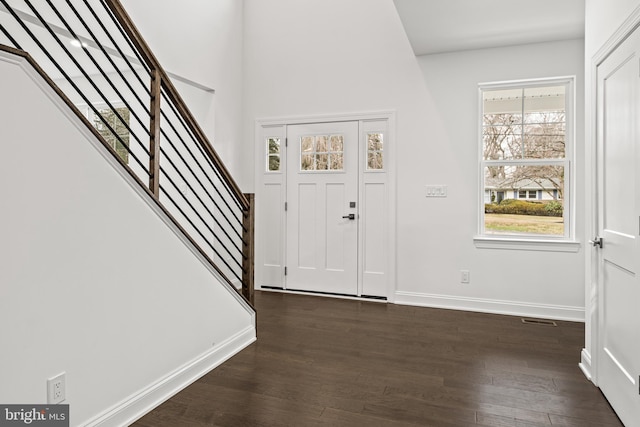 foyer featuring dark hardwood / wood-style floors