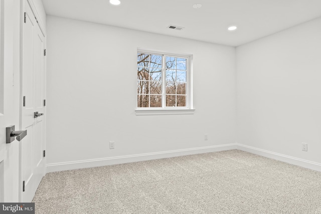 unfurnished room featuring carpet flooring