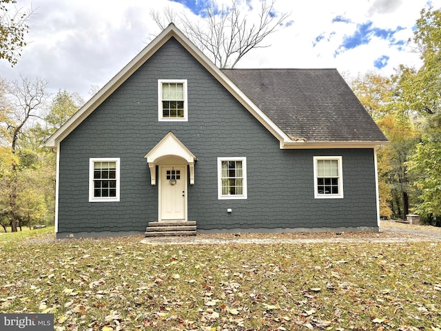 view of property with a front lawn