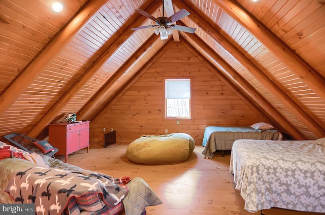 bedroom with wood ceiling, vaulted ceiling with beams, wood walls, light wood-type flooring, and ceiling fan