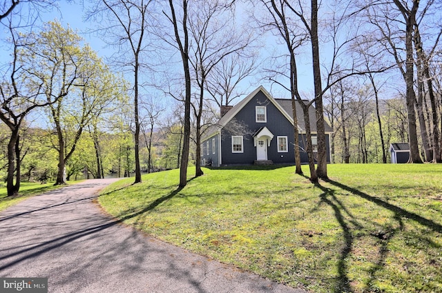 view of home's exterior featuring a lawn